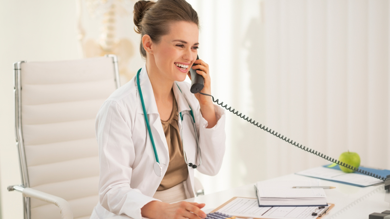 Proton therapy physician on the phone